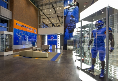 football display with a blue suit and wall graphics