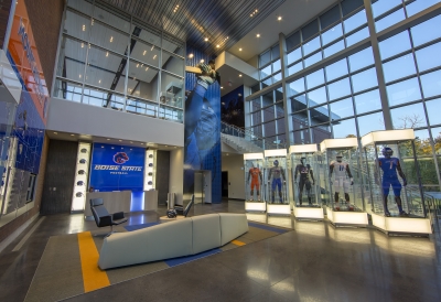 football suits in glass cases and wall graphics