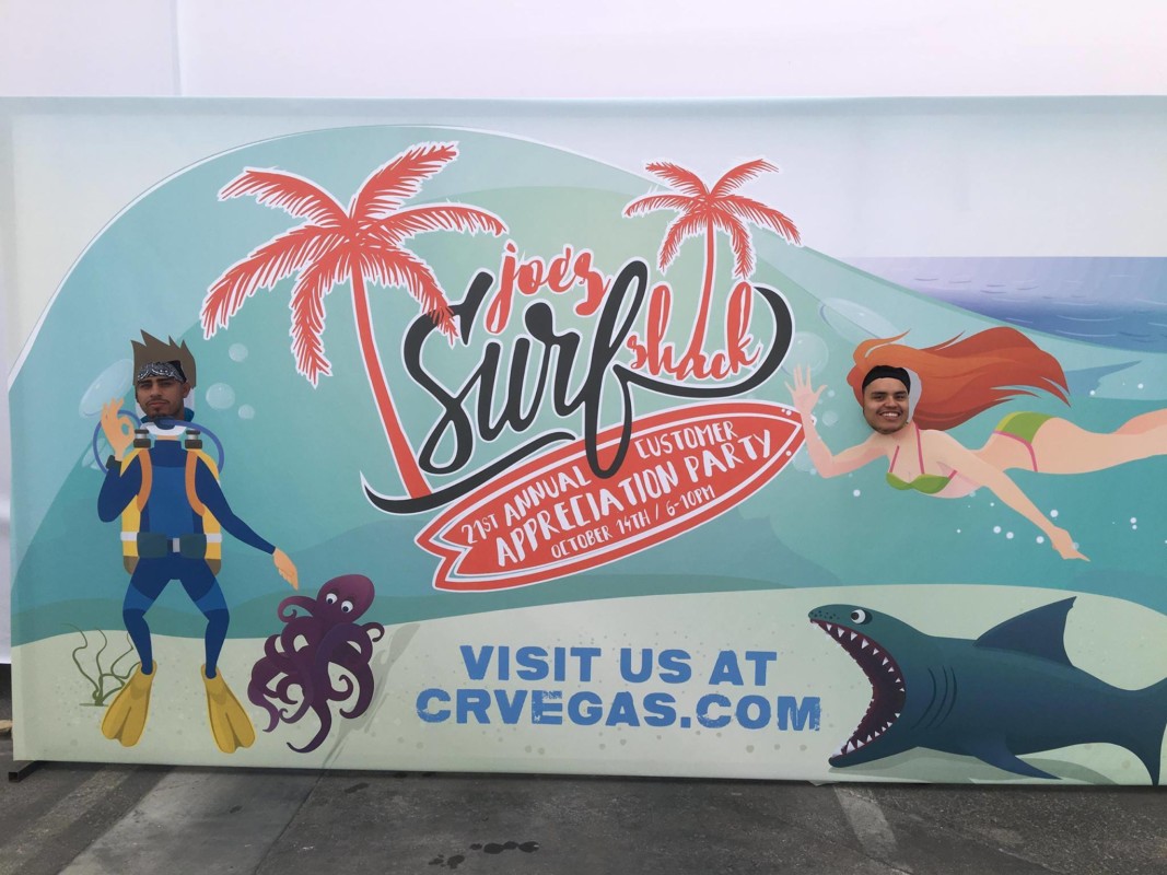 tropical sign with sharks and an island